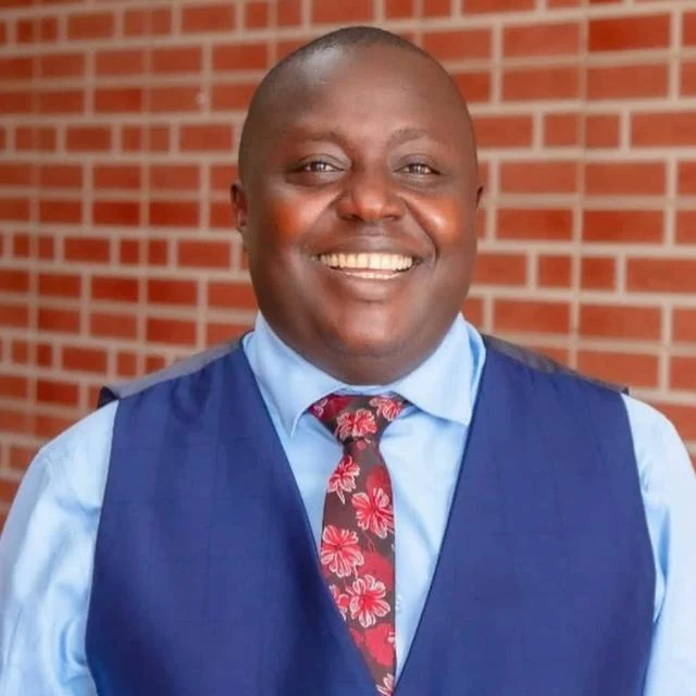 Mr. Ayub Kato, Managing Partner of Smiling Faces International